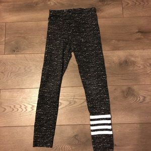 Black leggings with white stripes